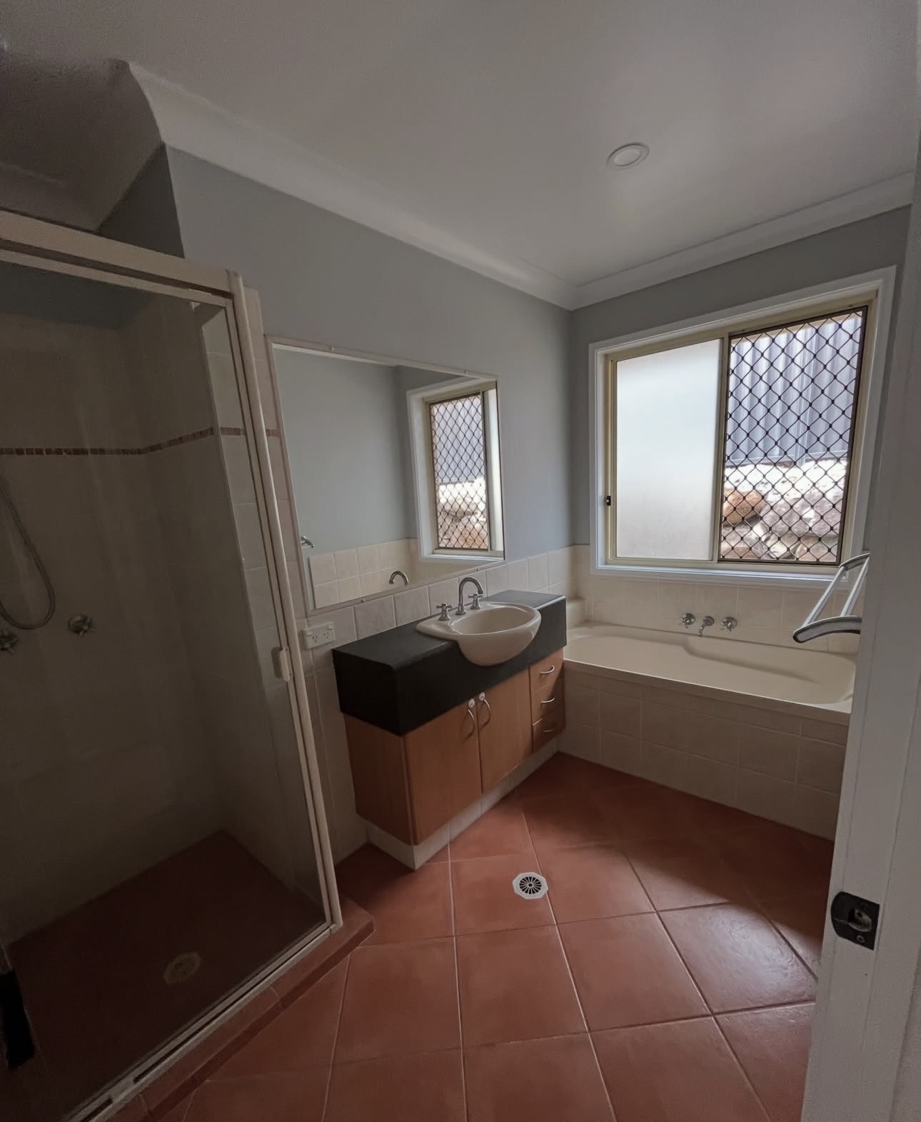 Old, leaking, outdated bathroom before renovation
