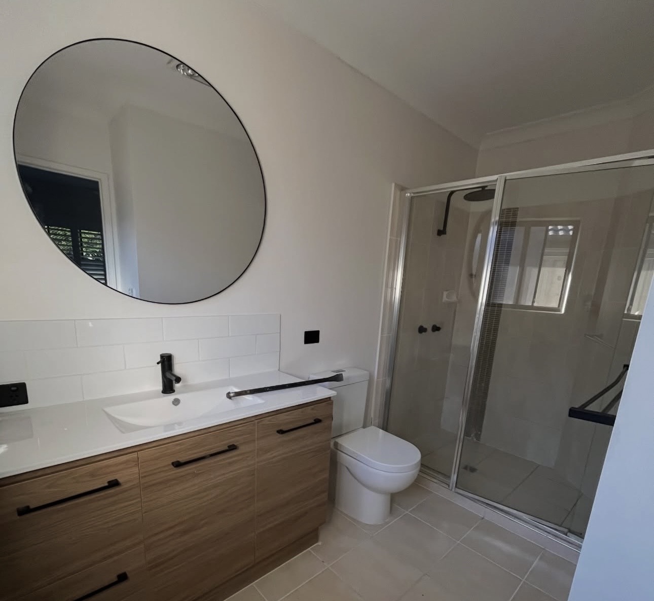 Old, leaking, outdated bathroom before renovation